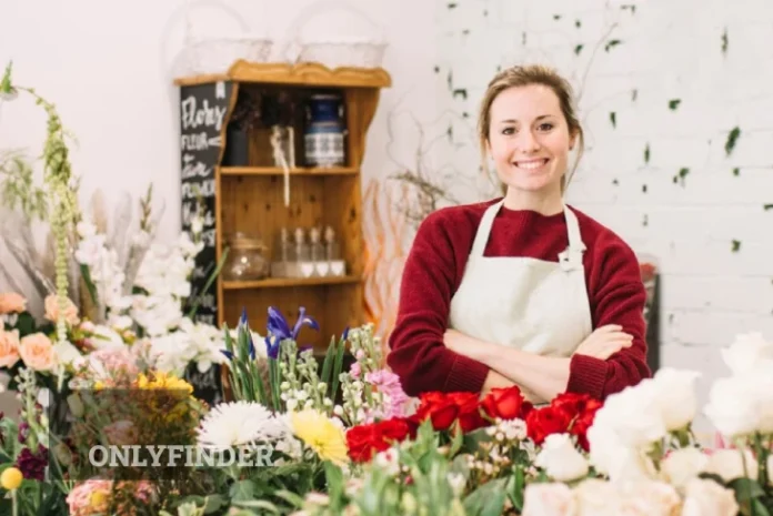 3 Online Marketing Tips for Your Florist Business A florist arranging colorful blooms, showcasing creative marketing tips for growing a florist business online.