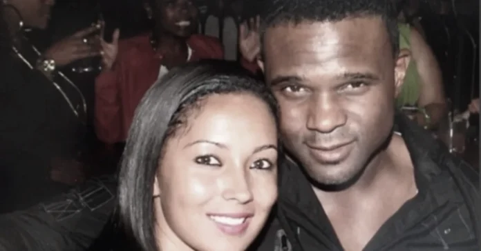 Juliette Vann Juliette Vann smiling next to a man at a crowded indoor event.