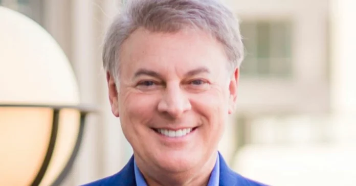 Lance Wallnau smiling in blue suit - evangelical preacher with $4 million net worth