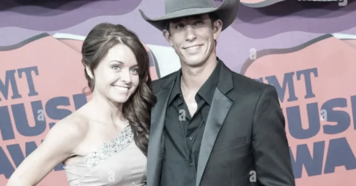 Lexie Wiggly and J.B. Mauney smiling on the red carpet at the CMT Music Awards.