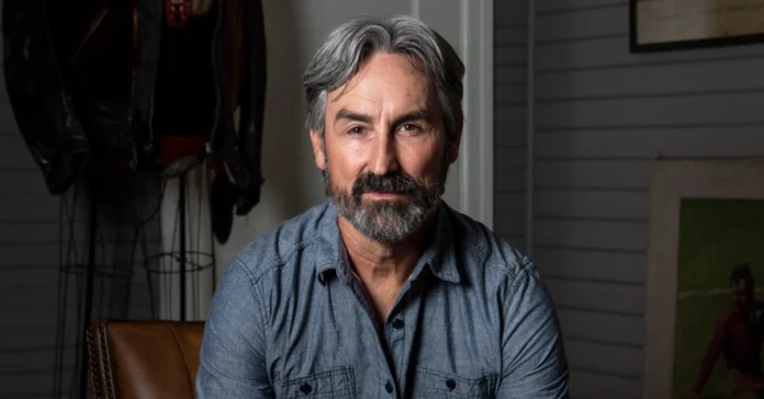 Mike Wolfe Passion Project in LeClaire, Iowa Mike Wolfe at his Passion Project, restoring vintage Americana in LeClaire, Iowa’s Antique Archaeology store.